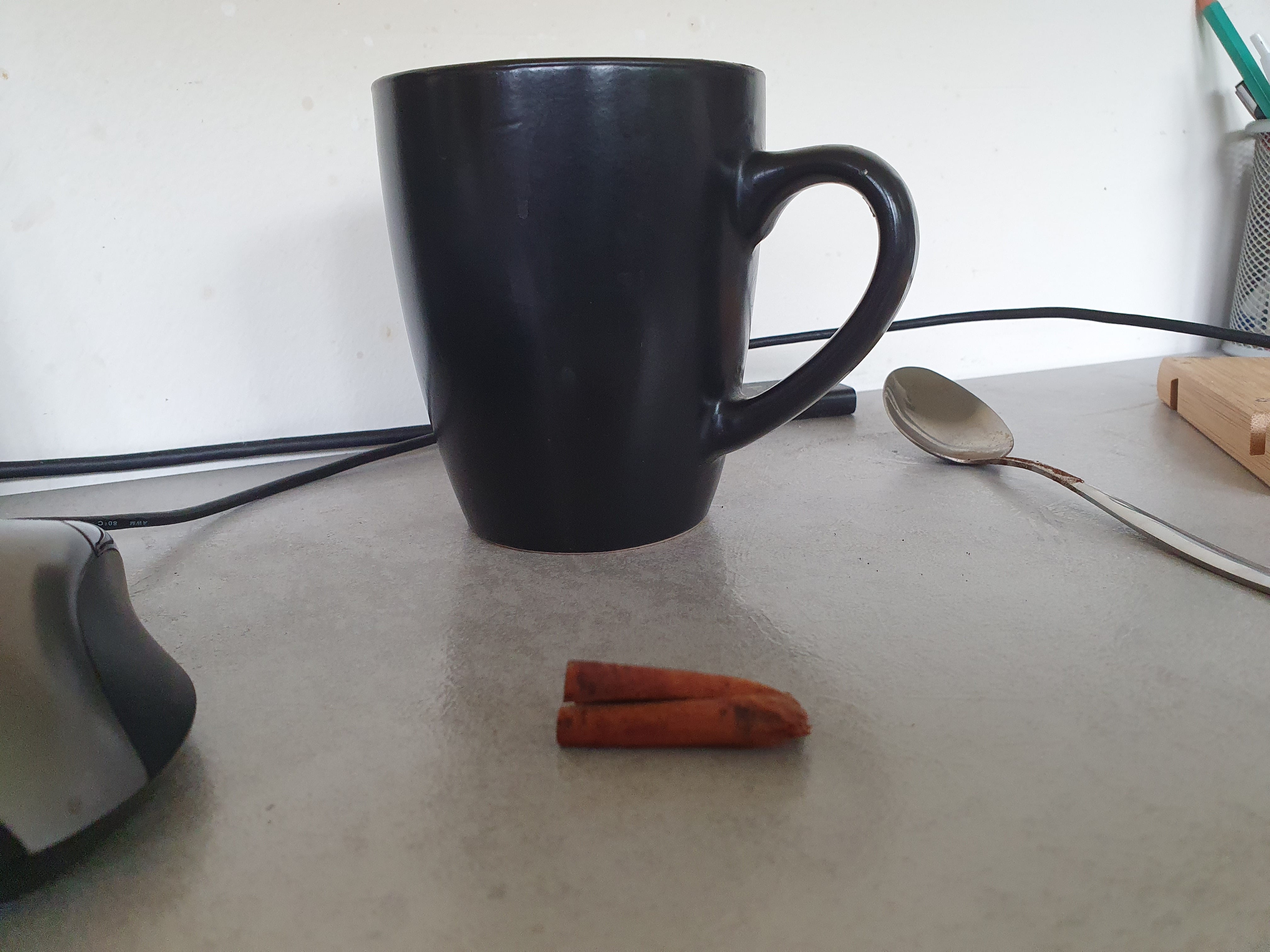 cinnamon stick and coffee cup