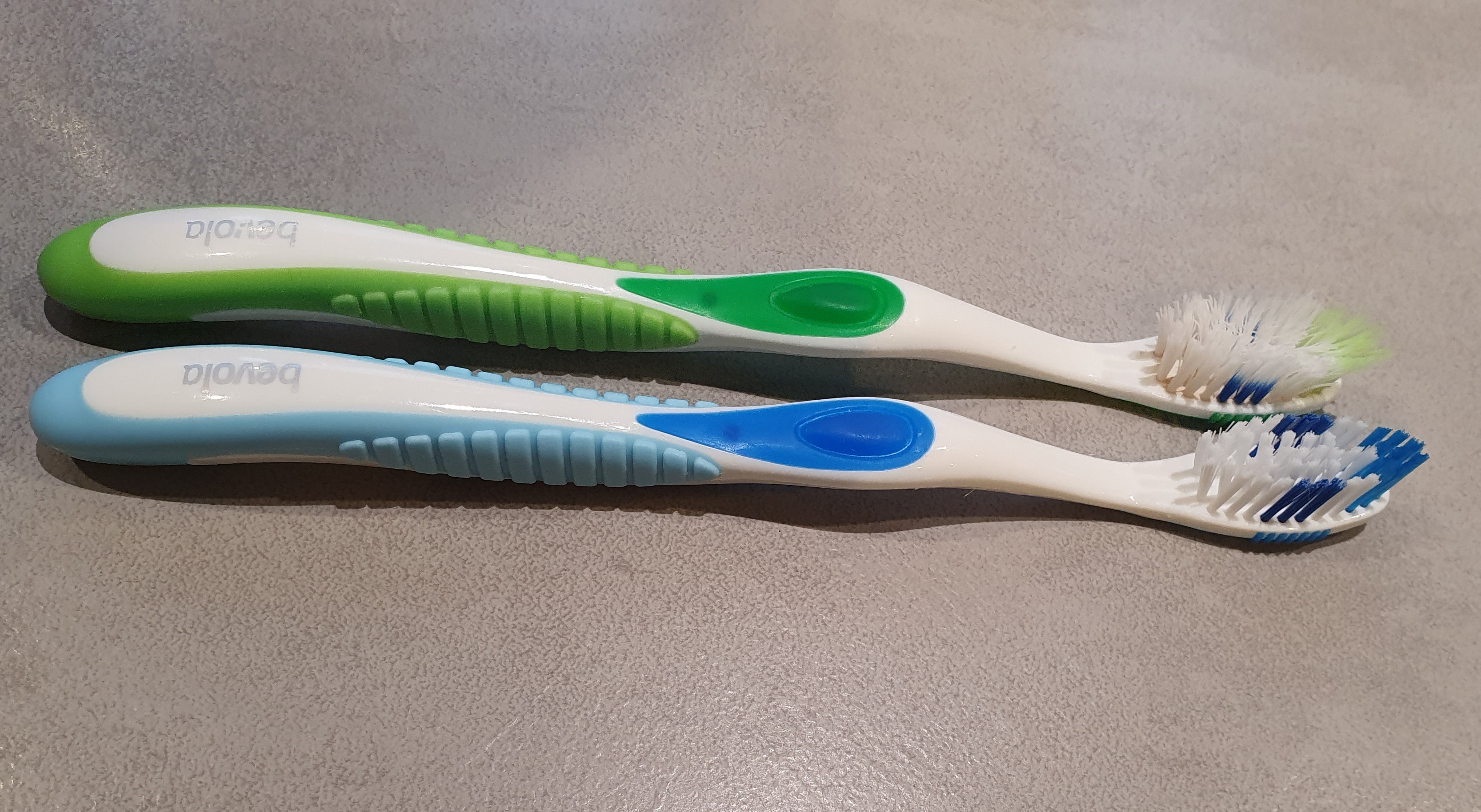 <image: old and new toothbrushes>